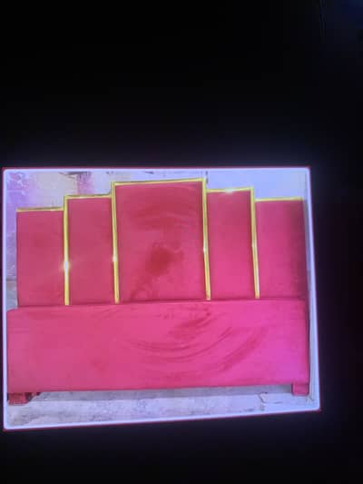 Maroon fully cushioned bed