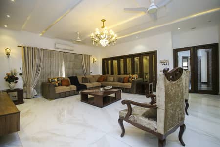 One Kanal Slightly Luxury Design Most Beautiful Full Basement Home Theater Bungalow For Sale At Prime Location Of DHA Lahore Near To Park Masjid & Commercial Market.