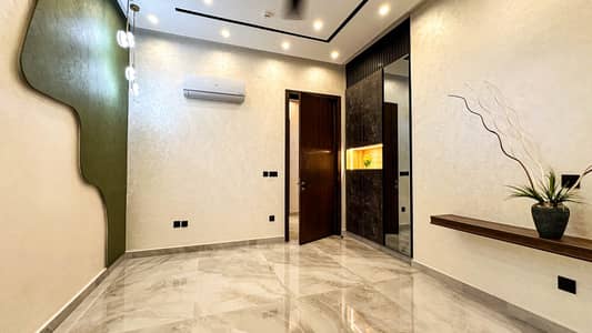 One Kanal Brand New Luxury Ultra-Modern Design Most Beautiful Bungalow 2 Servant Quarter In Basement For Sale At Prime Location Of DHA Lahore Near To Park Masjid & Commercial Market.