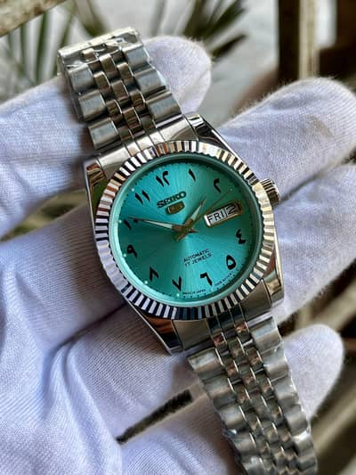 seiko 5 automatic cut ring watch