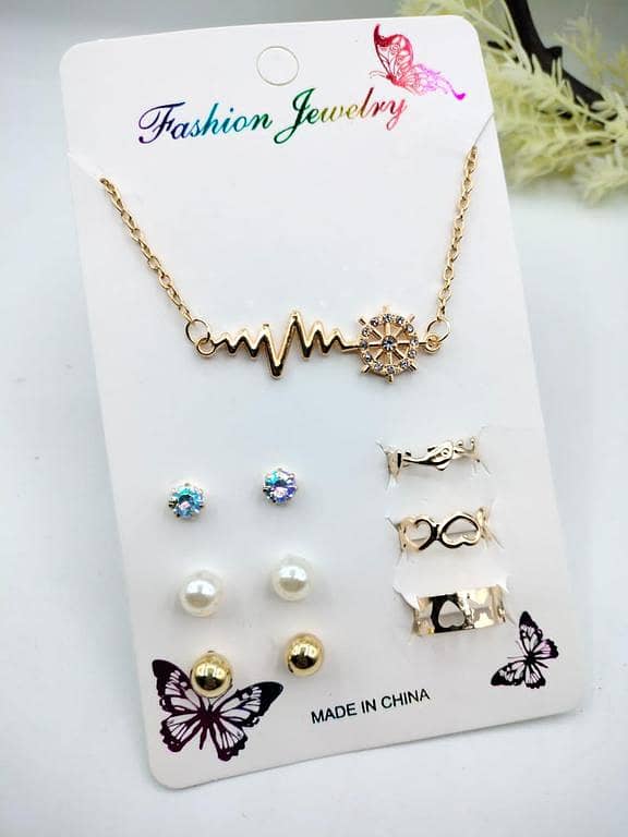 Pack of 7 Jewellery Set: 1 Necklace/Pendant, 3 Stud Earring Pairs, and 3 Adjustable Rings