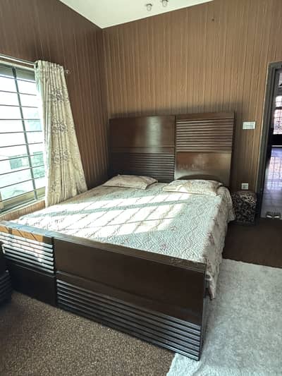 Bed with two side tables