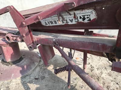 Rhodes grass cutter