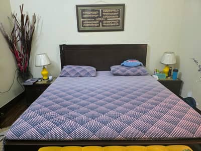 double bed with side tables