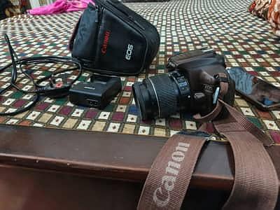 Canon 1100D dslr camera with 18-55mm lens video supports 03025271768