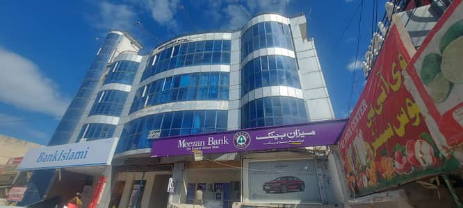 SHOP FOR RENT ADYALA TOWER, Rawalpindi. Ideal For Pharmacy, Clinic, Or Retail. Spacious Shop With Glass Door, Bright Lighting, On Main Road With Parking. CCTV-Enabled, Rs. 75,000/Month.