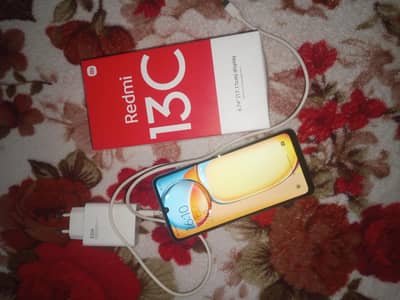 Redmi 13c 8/256 with box and change. .
