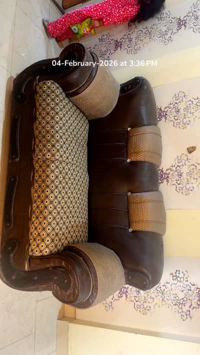 Sofa 5 seater price 16000. Table 5000  please olx chat