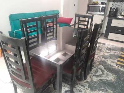 interwood dinning table and customized chairs