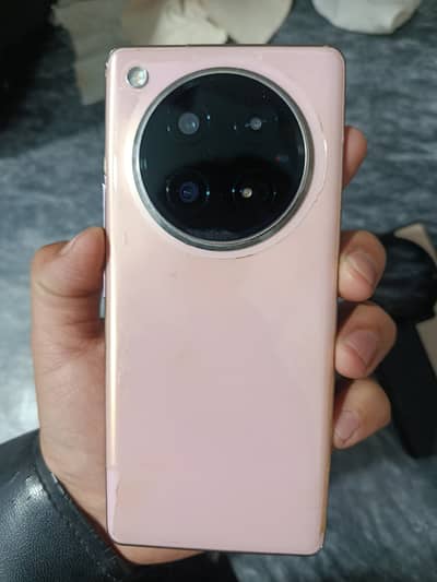 Infinix Zero 40 4G smartphone in the Blossom Glow color.