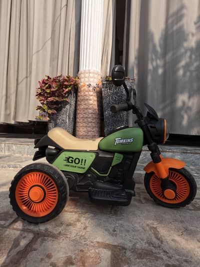 Tomkin motor sport super battery scooter for kids