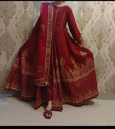 stitched front open frock. . best quality and embroidery golden . in good