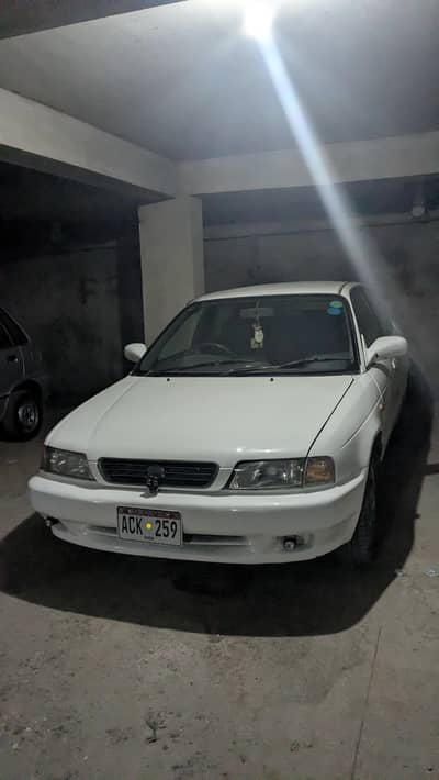 Suzuki Baleno Jxr 1999 model 1.3 cc supreme white color