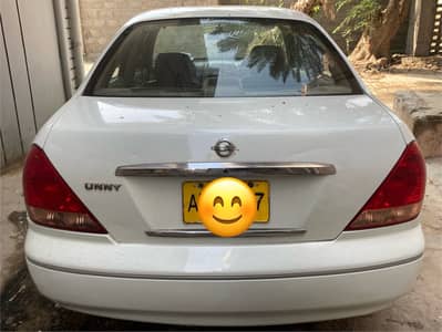 Pearl white Nissan Sunny