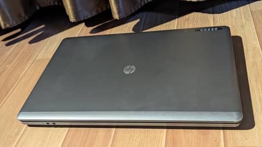 Hp pro-book 9/10 condition (paint damage on edges)