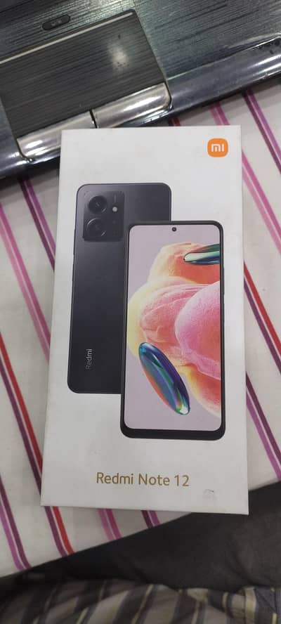 REDMI NOTE 12 8GB 128GB USED WITH COMPLETE BOX PTA APPROVED