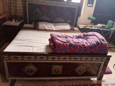 king size bed,2 side tables and dressing table.