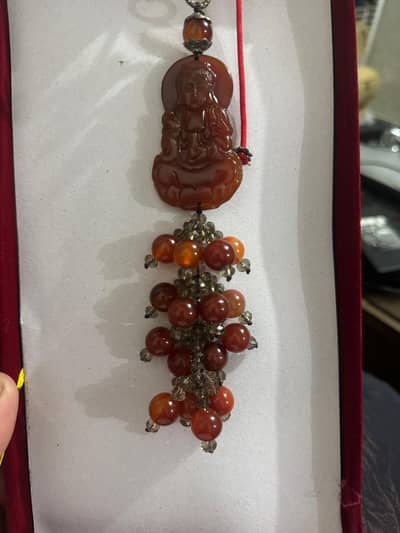 anciant budda made from orignal Jade and coins