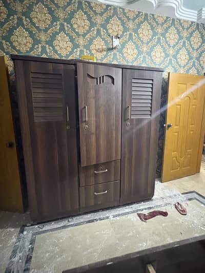 bed without mattress and wardrobe