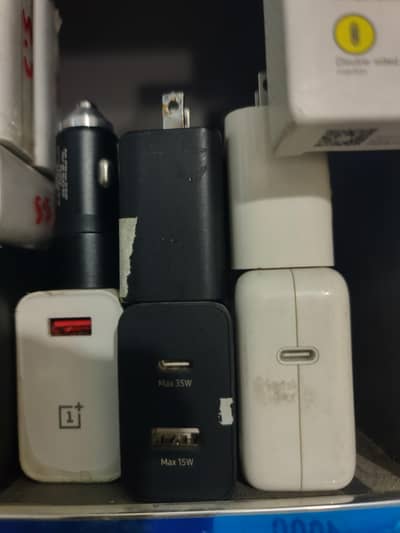 mobile chargers xiaomi 120 watt and apple 30 watt chargers