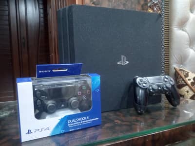 PS4 Pro 1 tb jailbreak 3 orignal controllers 20 games installed