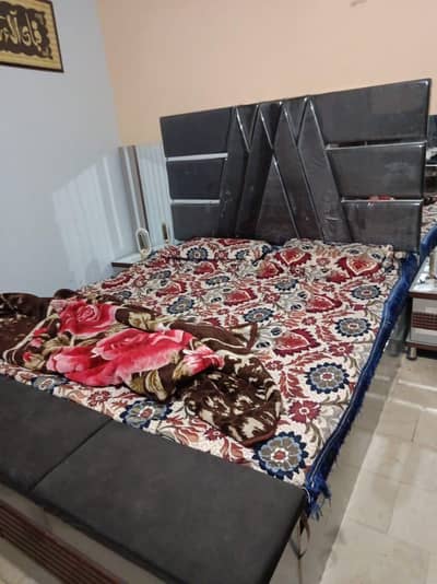 King size bed with metres and side table