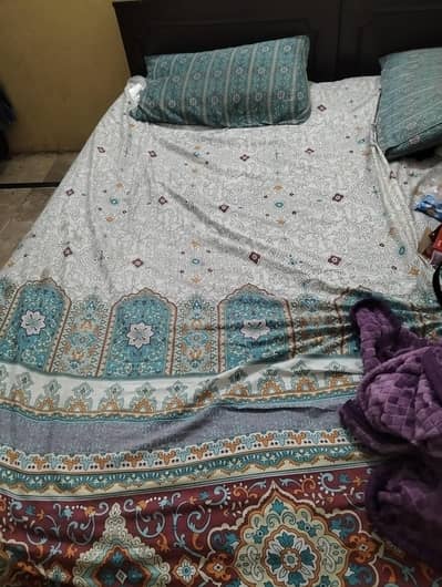 2 single wooden beds available for sale with mattress.