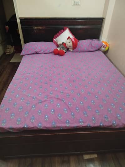 Queen bed without mattress with side table and mirror