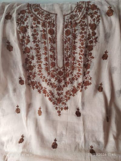 it's hand made embroidery  fabric khadi net