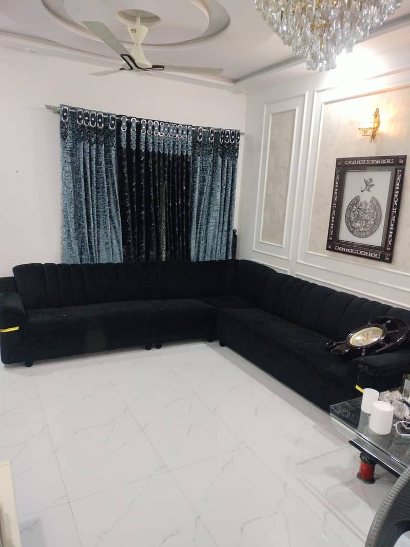 corner large size sofa with center mirror table 1