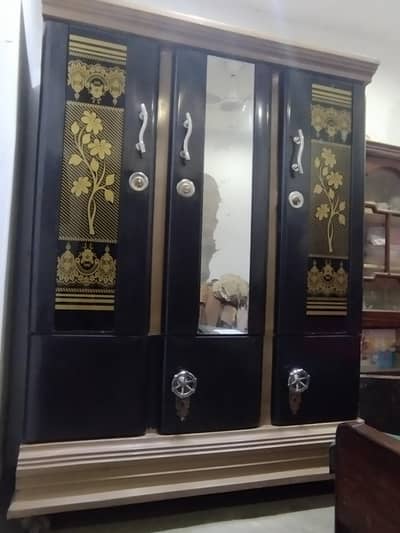 Three-door iron wardrobe for sale