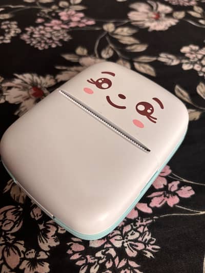 Inkless Pocket friendly mini printer