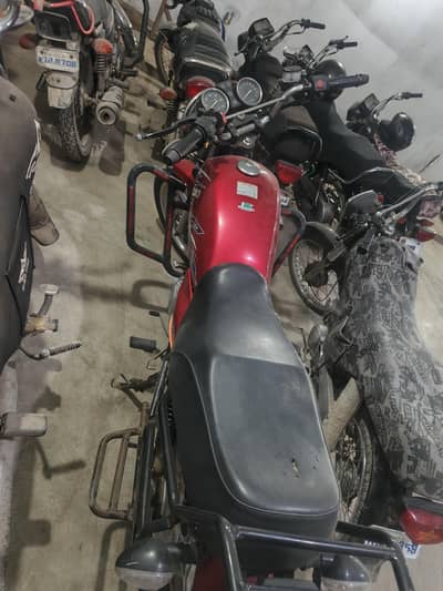 Red Suzuki 150 For sale