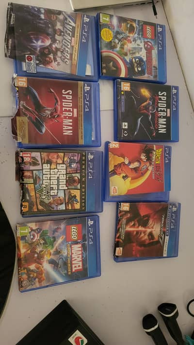 PS4 pro 1TB with 2 controllers and 8 games
