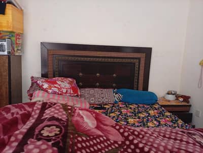 king size bag in a good condition with matters with two side tables