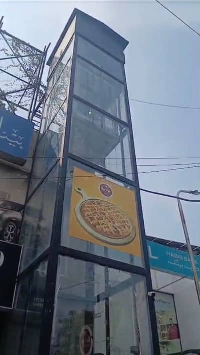 Lift cabin with glass