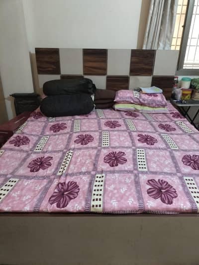 wooden king size bed with mattress