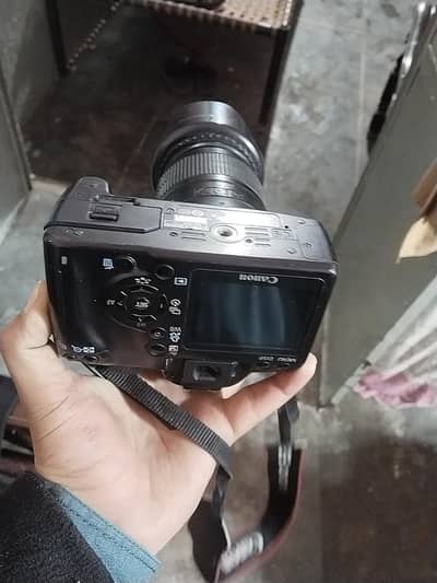 canon 1300D with lens