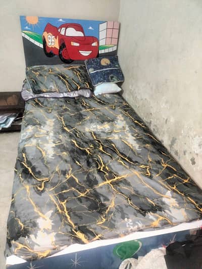 Bed with mattress and Wardrobe