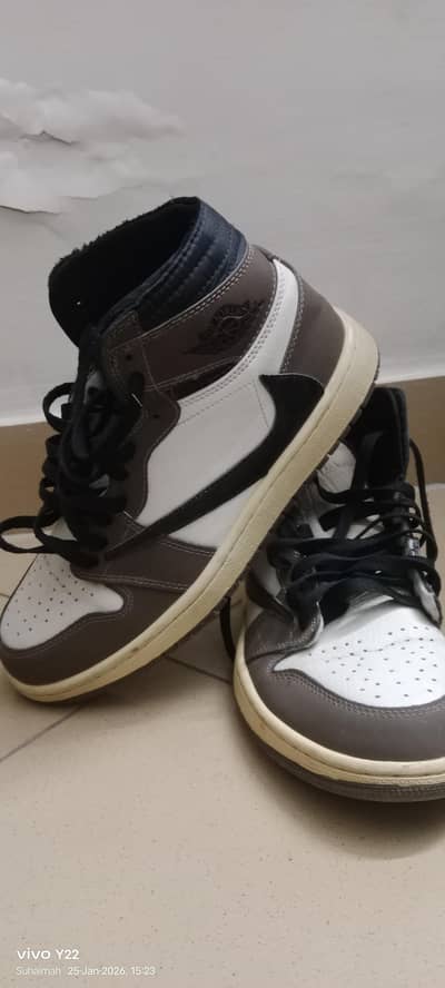 Nike air Jordan in brown and white. for more info contact 03314211211