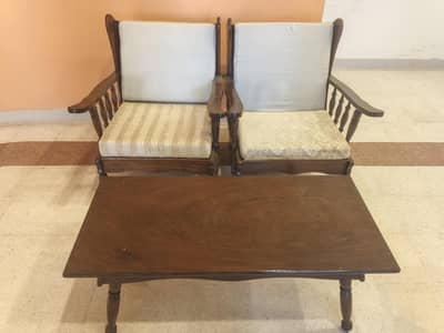 Old Wooden Table with two Sofas Chair