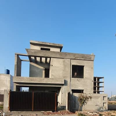 10-Marla Grey Structure House Available On Cash At Minimum Price In LDA Approved Society