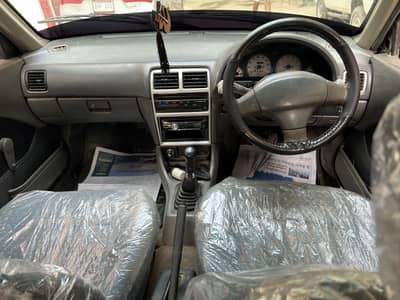 Suzuki Cultus vxr 2004 silver petrol 2nd owner btr Mehran