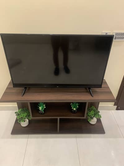 TV CONSOLE NEW 18000 SLIGHTLY USED