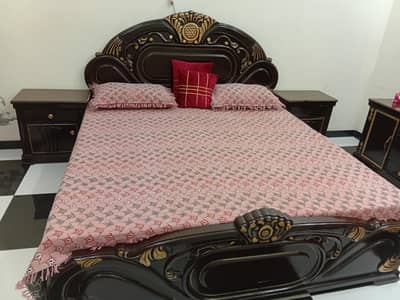 Stunning Dark Wood Bed with Gold Accents