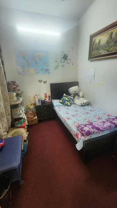 Furnish room available in G11/2 for lady with mess from 1st March