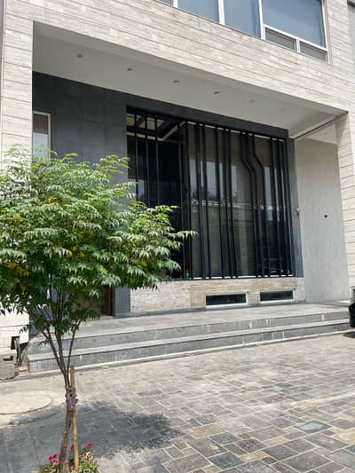 Business-Class Zone in DHA Phase 1 Stylish Ground + Mezzanine 4 Marla Unit Ideal for Retail, Franchise, or Office