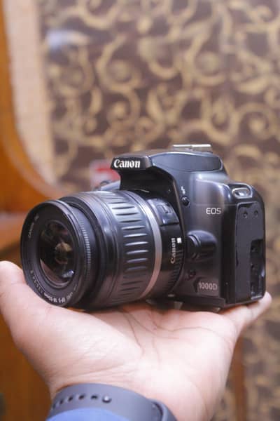 Canon 1000d with 18 55mm lens under