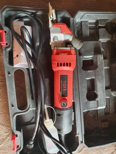 بھیڑوں کی اون اتارنے والی مشین