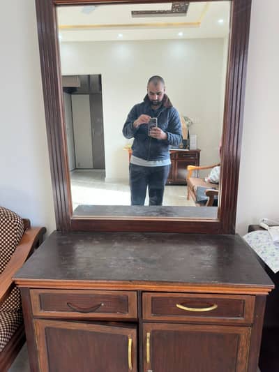 Hard wood dressing table and cabinets at 20K each